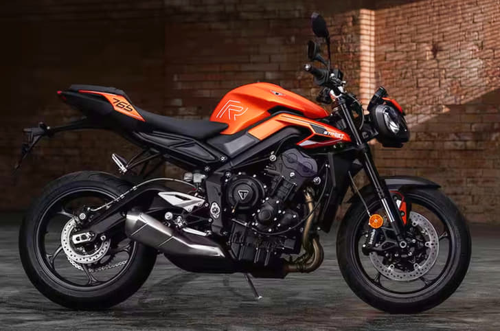 Triumph Street Triple R in orange side profile shot
